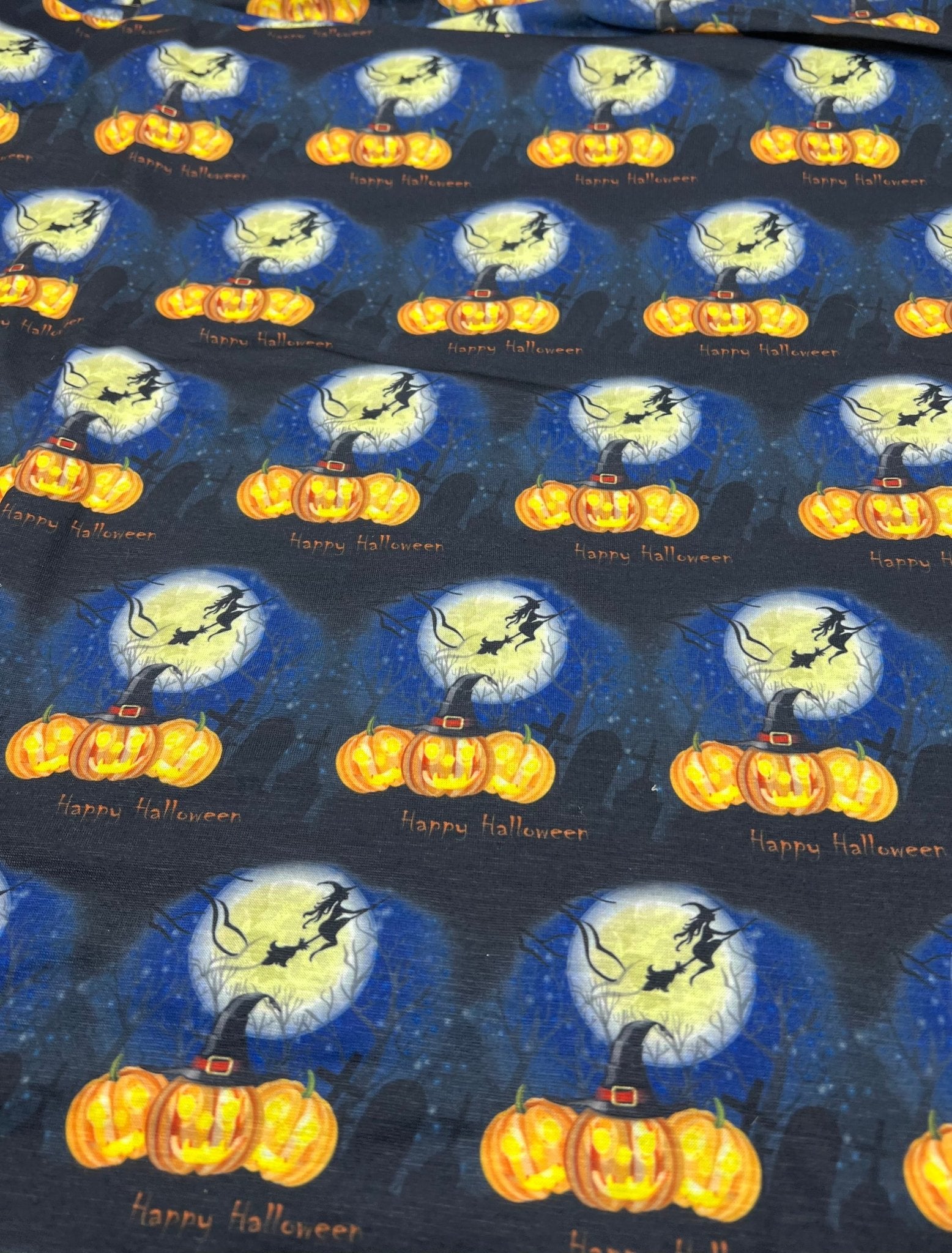 Blue Pumpkin Witch Print Spun Poly Stretch Fabric - T9 Fabrics